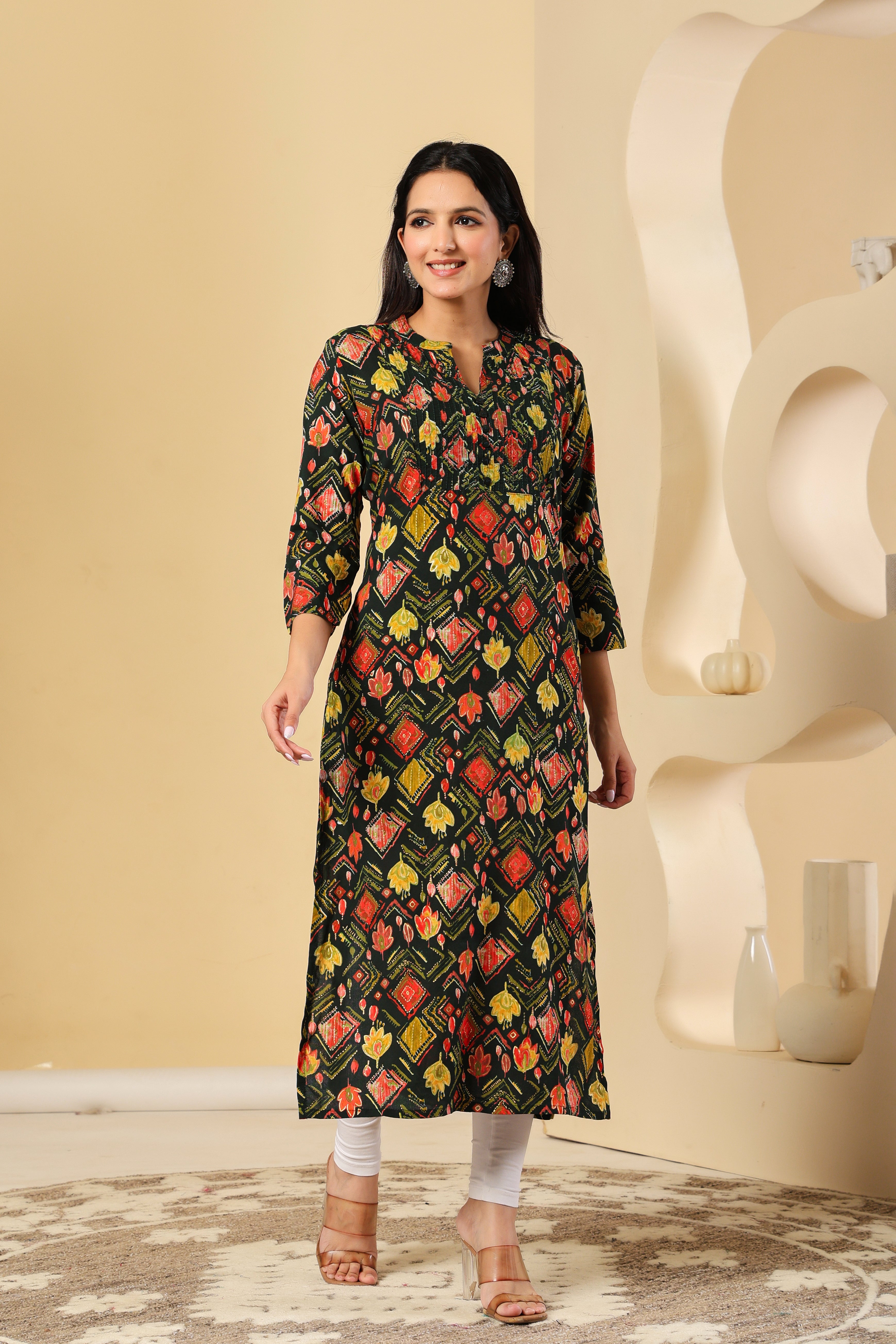 Black Printed Cotton Kurti with Multicolor Motifs – Stylish & Comfortable