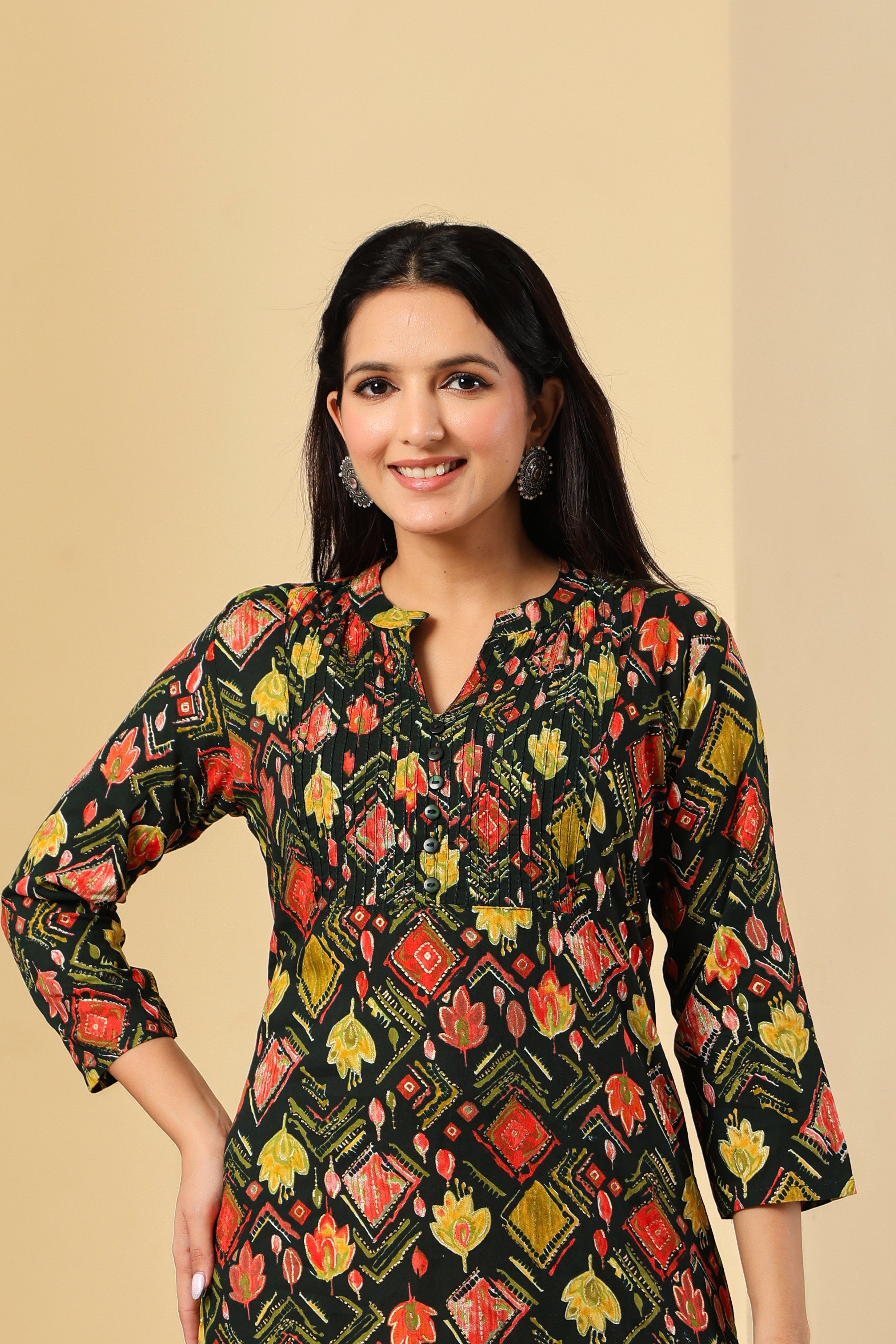 Black Printed Cotton Kurti with Multicolor Motifs – Stylish & Comfortable