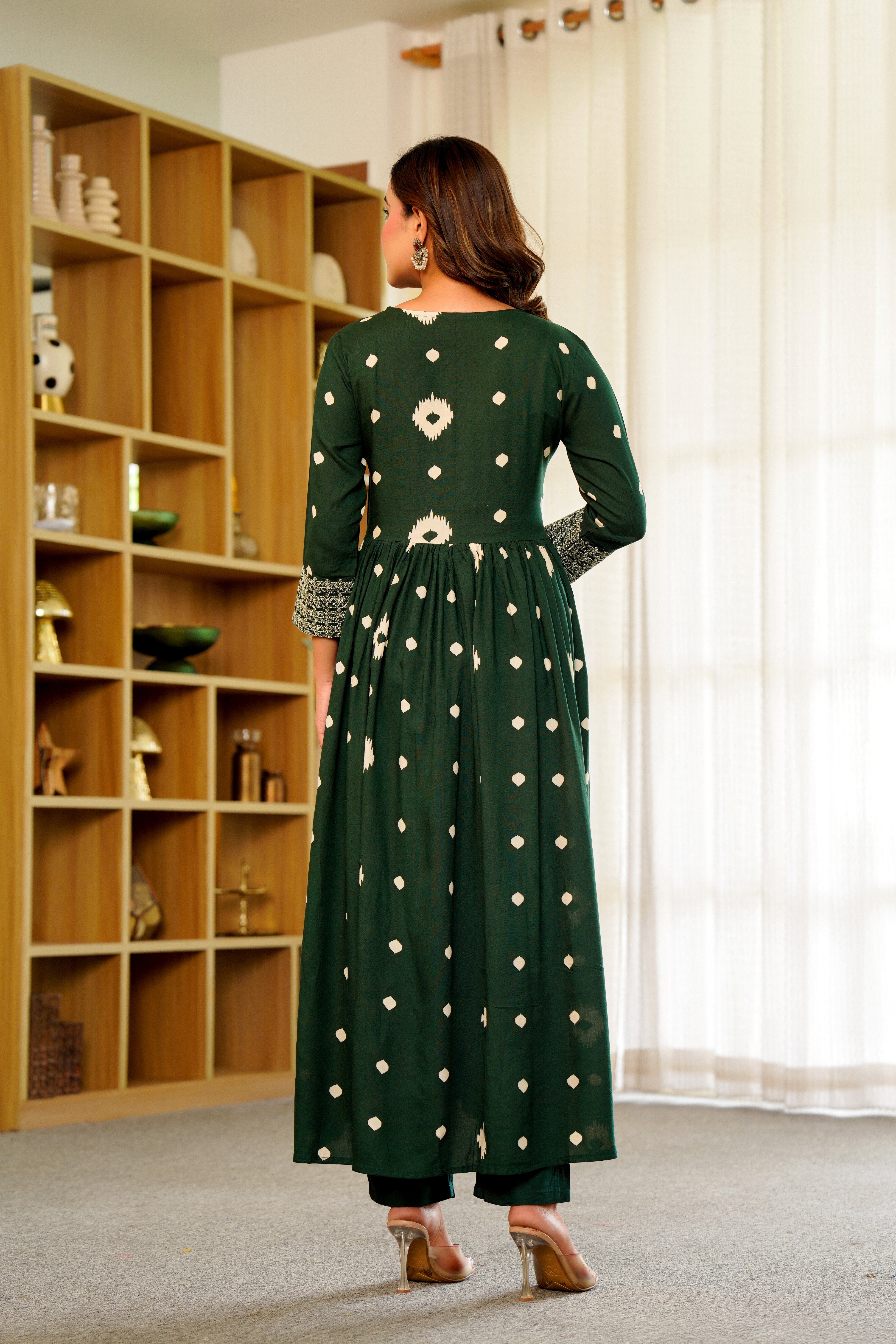 🌿 Elegant Green Anarkali with White Ikat Motifs